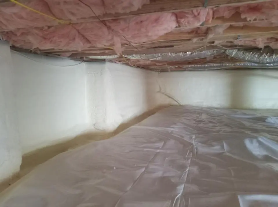 Crawl space encapsulation with closed-cell spray foam for Roof Waterproofing in East Rockaway